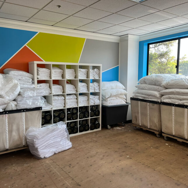 Room full of lines on shelves and in bins.