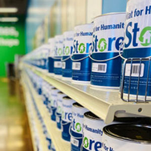 Paint can on shelves in a ReStore.