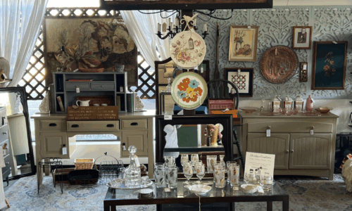 area featuring thrifted furniture and home decor items